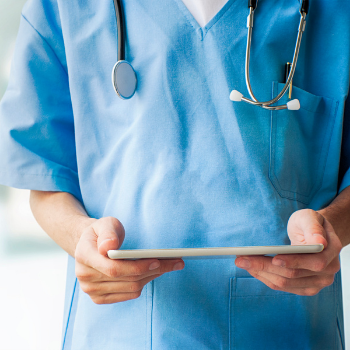Doctor with tablet Doctor with tablet